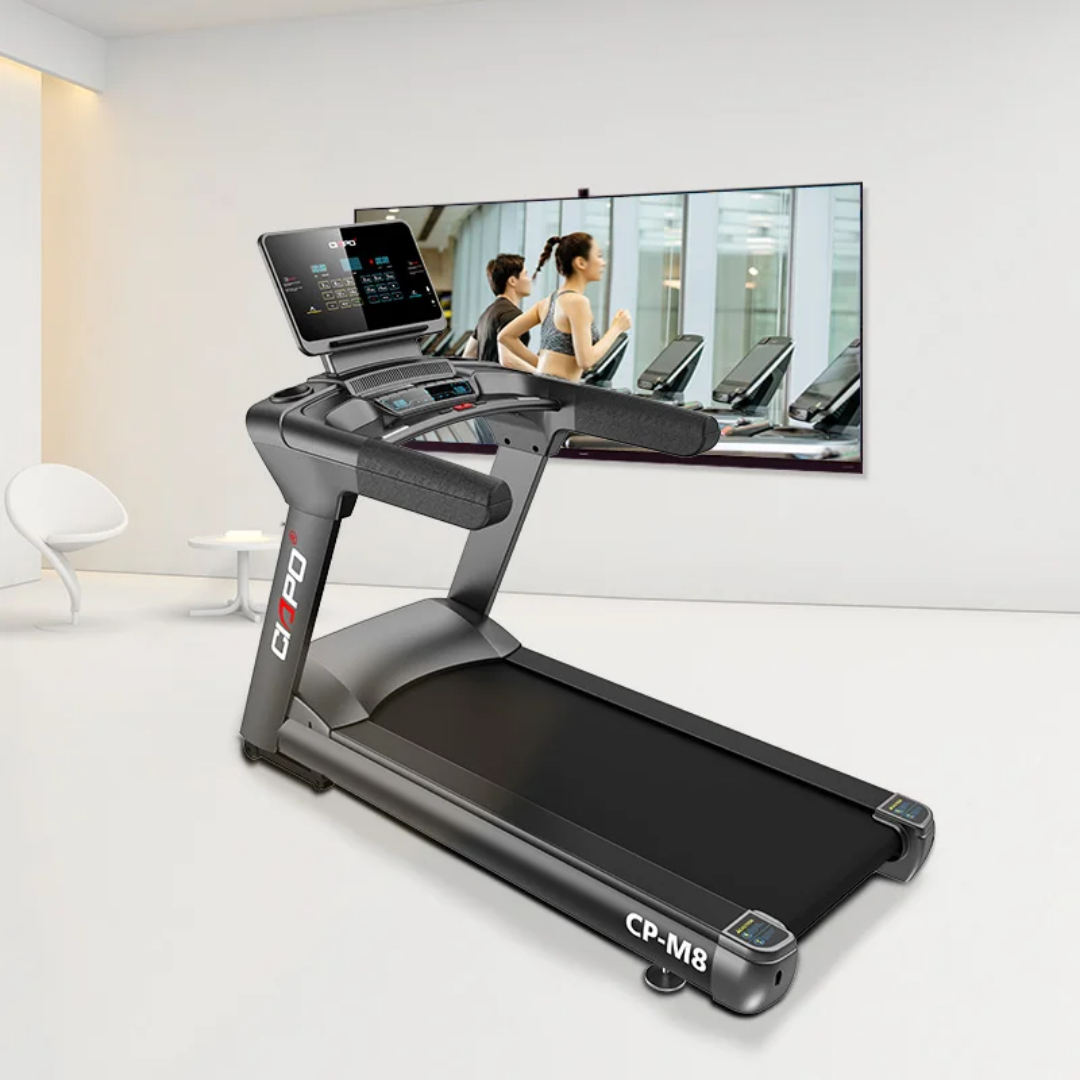 Modern treadmill with a large console and dual curved handrails in a bright, minimalist gym; CP-M8 branding visible on the side panel.